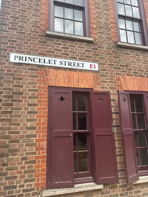 The Princelet Street E1 sign above old wooden shutters